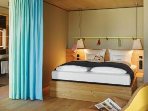 Ліжко або ліжка в номері 25hours Hotel Langstrasse