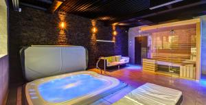 Posteľ alebo postele v izbe v ubytovaní WILLIAM Congress&Wellness Mountain HOTEL ****