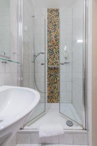 Koupelna v ubytování Hotel Aigner