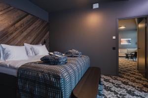 Postel nebo postele na pokoji v ubytování Design Hotel Levi