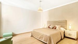 Cama ou camas em um quarto em Villa Marina