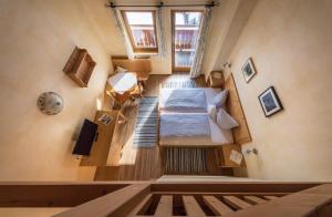 Krevet ili kreveti u jedinici u okviru objekta Hotel Gasthof Stuibenfall