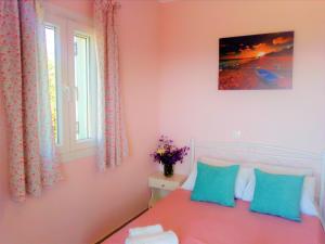 A bed or beds in a room at Sea View Private Pool Villa