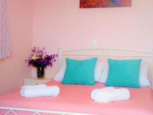 A bed or beds in a room at Sea View Private Pool Villa