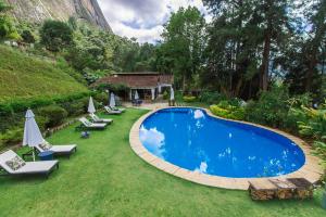 
A piscina localizada em Pousada Chácara Aracê ou nos arredores
