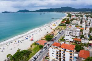 an aerial view of a beach in a city at Apart Hotel Vila Mar in Florianópolis