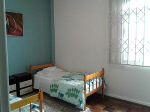 Giường trong phòng chung tại Pousada do Parque