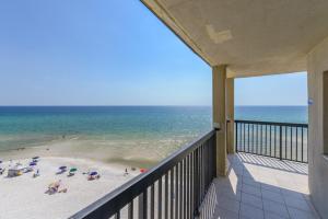 a balcony with a view of the beach at Pinnacle Port Condos in Panama City Beach