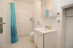 Koupelna v ubytování Apartment Svid + 37 fotografií