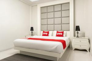 Cama o camas de una habitación en OYO 800 Orbit Key Hotel