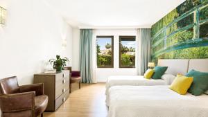 Cama ou camas em um quarto em Villa Marina