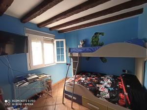 Posteľ alebo postele v izbe v ubytovaní casa rural Sombra de la Atalaya + 7 fotografií