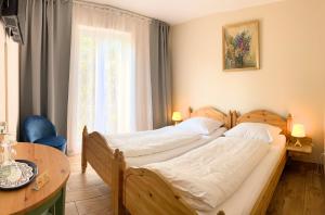 Postel nebo postele na pokoji v ubytování Arena Stadt München