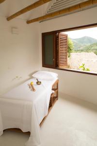 Ένα ή περισσότερα κρεβάτια σε δωμάτιο στο Entremonte Wellness Hotel and Spa