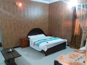 Llit o llits en una habitació de Hotel Hill City Mingora Swat