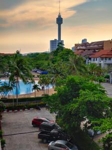 a parking lot with a view of the korea tower at View Talay 1B by Fernando in Pattaya South