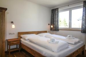 Легло или легла в стая в Tauern Relax Lodges by we rent, SUMMERCARD INCLUDED