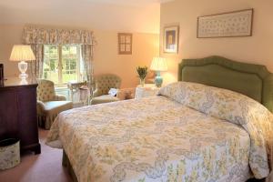 A bed or beds in a room at Middlethorpe Hall & Spa