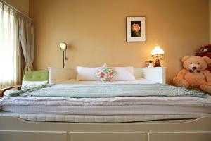 Rúm í herbergi á Focaccia Manor B&B