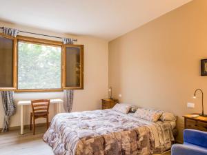 A bed or beds in a room at Apartment Il Venturino-2 by Interhome