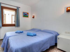 Posteľ alebo postele v izbe v ubytovaní Apartment Can Panxo by Interhome