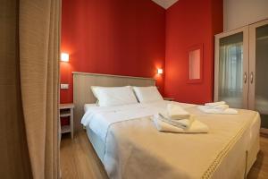 Posteľ alebo postele v izbe v ubytovaní Residenza Palazzo Negri