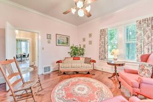 a living room with a couch and a chair at Elegant and Spacious Retreat about 18 Mi to Lake Norman! in Lincolnton