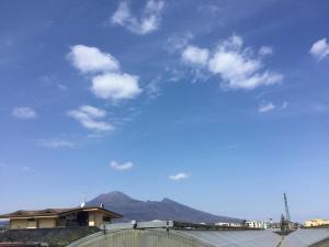 a blue sky with a mountain in the background at Maria's home in Pompei