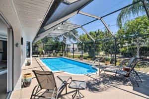 an image of a swimming pool in a house at Modern House Less Than 5 Miles to Port Charlotte Beach! in Port Charlotte