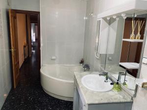 Ванная комната в Habitaciones dakar