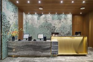 Lobbyen eller receptionen på Jasper Young Hotel Banqiao