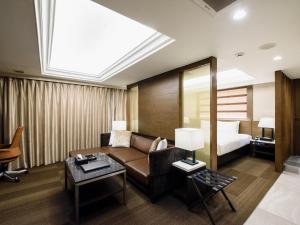 Ένα ή περισσότερα κρεβάτια σε δωμάτιο στο Meguroholic Hotel +30 φωτογραφίες
