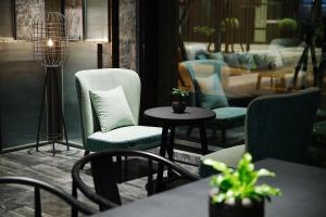 Χώρος καθιστικού στο Jasper Young Hotel Banqiao
