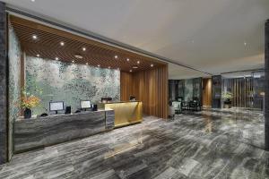 Μια τηλεόραση ή/και κέντρο ψυχαγωγίας στο Jasper Young Hotel Banqiao