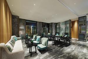 Χώρος καθιστικού στο Jasper Young Hotel Banqiao