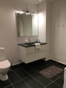 Kúpeľňa v ubytovaní Skagen New City Apartments 1D