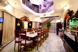 Aman Homestay, A Boutique Hotel餐厅或其他用餐的地方