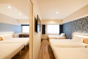 Vuode tai vuoteita majoituspaikassa karaksa hotel TOKYO STATION