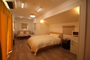 Tempat tidur dalam kamar di Mount Fuji Panorama Glamping