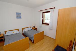Postel nebo postele na pokoji v ubytování Apartment Classic