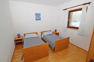 Postel nebo postele na pokoji v ubytování Apartment Classic