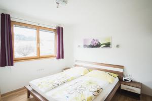 Posteľ alebo postele v izbe v ubytovaní Apartment Sunshine