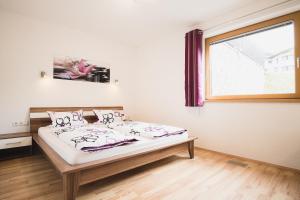 Posteľ alebo postele v izbe v ubytovaní Apartment Sunshine