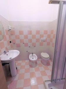 Koupelna v ubytování Hotel Alba Chiara Sant'Andrea Salento