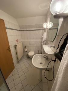 Koupelna v ubytování Appartement Vermietung Jensen