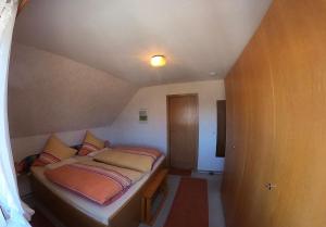 Postel nebo postele na pokoji v ubytování Appartement Vermietung Jensen