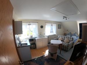 Kuchyň nebo kuchyňský kout v ubytování Appartement Vermietung Jensen