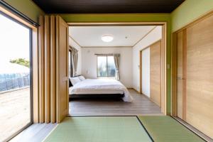 Katil atau katil-katil dalam bilik di Furaku-Dog