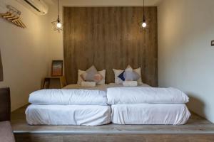 Postel nebo postele na pokoji v ubytování Cozy House Hostel