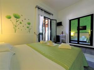 Postel nebo postele na pokoji v ubytování Hotel Alba Chiara Sant'Andrea Salento